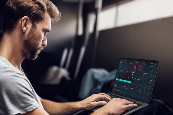 SOUL777 Live Casino — Join thrilling real-dealer tables A professional dealer in a tuxedo greeting players at the roulette table, symbolizing the authentic live casino feel at SOUL777.